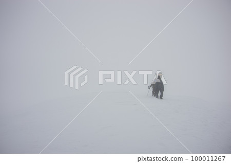 Snowboarders and skiers hiking in the backcountry of Niseko Annupuri in Kutchan-cho, Abuta-gun, Hokkaido Snowboarders and skiers hiking in the backcountry of Niseko Annupuri in Kutchan-cho, Abuta-gun, Hokkaido 100011267