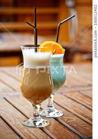 Coffee latte and blue cocktail Coffee latte and blue cocktail 100012402