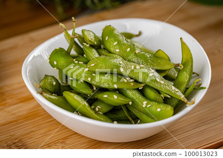 Edamame or soybeans with sesame seeds Edamame or soybeans with sesame seeds 100013023