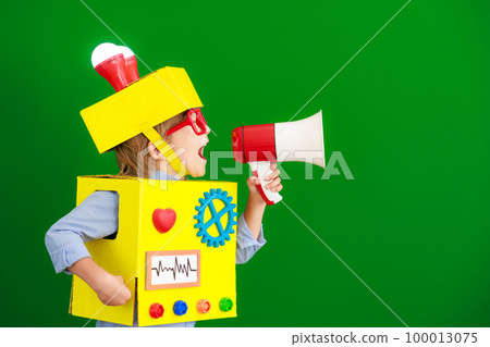 Happy child wearing a robot Happy child wearing a robot 100013075