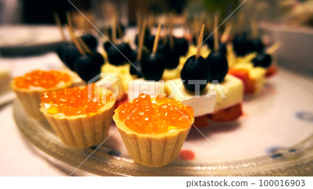 Tartlets with red caviar close-up Tartlets with red caviar close-up 100016903