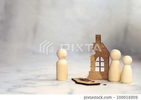Divorce, division of property, poverty and no money concept. Wooden broken house on light background. Mortgage, rent, realtor concept copy space space for text Divorce, division of property, poverty and no money concept. Wooden broken house on light background. Mortgage, rent, realtor concept copy space space for text 100018809