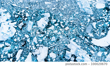Melting Arctic Ice in Ocean Water, Blue Glacier Ice with Snow in Iceland. Climate Crisis 100020670