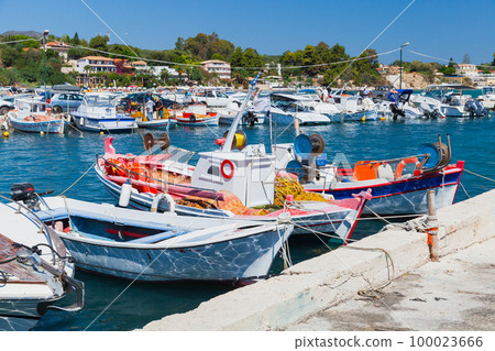 Small fishing boats are moored in port of Agios Sostis village. Zakynthos Small fishing boats are moored in port of Agios Sostis village. Zakynthos 100023666