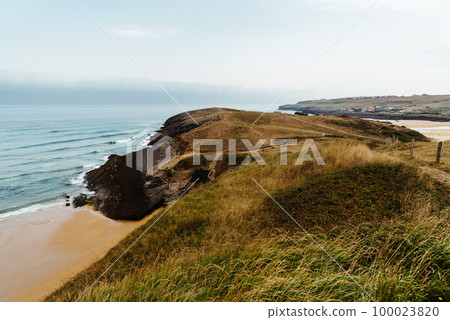 Antuerta Beach. Beach surrounded by cliffs and very popular for surfers 100023820