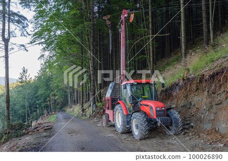 Traktor and forest cableway for timber concentration uphill, downhill on beskid mountains. 100026890