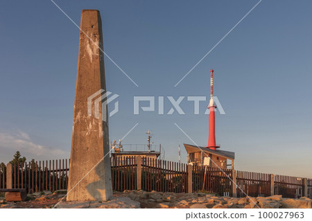 Concrete obelisk and meteorologist station and television transmitter on Lysa Hora, beskid mountains, Czech republic at summer sunset time. Concrete obelisk and meteorologist station and television transmitter on Lysa Hora, beskid mountains, Czech republic at summer sunset time. 100027963