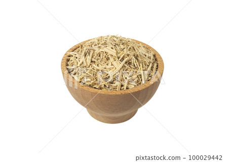 siberian ginseng in latin Eleutherococcus senticosus in wooden bowl isolated on white background. siberian ginseng in latin Eleutherococcus senticosus in wooden bowl isolated on white background. 100029442