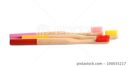 Natural bamboo toothbrushes with soft bristles isolated on white Natural bamboo toothbrushes with soft bristles isolated on white 100035217
