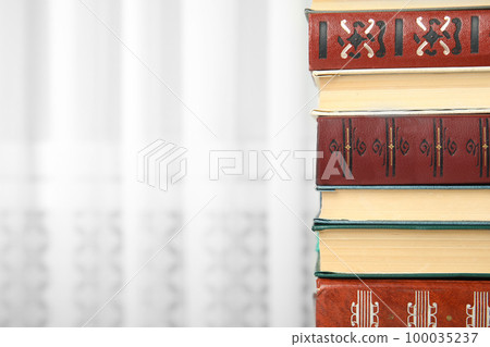 Collection of different books indoors, closeup. Space for text 100035237