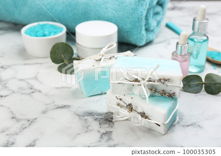 Natural handmade soap bars on marble table Natural handmade soap bars on marble table 100035305