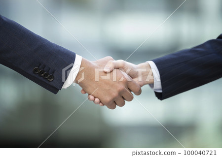 Hands of two businessmen shaking hands Photo cooperation "LINK FOREST" Hands of two businessmen shaking hands Photo cooperation "LINK FOREST" 100040721