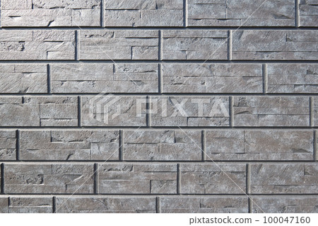 Brick-like background material, stone pavement, uneven design Brick-like background material, stone pavement, uneven design 100047160