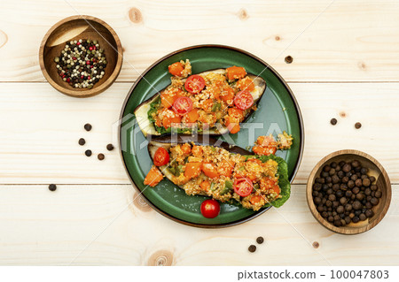 Yummy vegetarian food, stuffed eggplant Yummy vegetarian food, stuffed eggplant 100047803