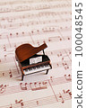 antique piano and sheet music 100048545