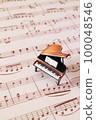 antique piano and sheet music 100048546