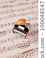antique piano and sheet music 100048547