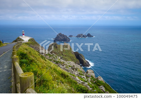 Lighthouse, Cape Ortegal cliffs and atlantic ocean, Galicia, Spain 100049475