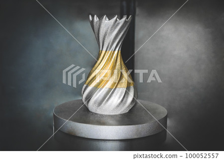 Object printed on metal 3d printer close-up. Object printed in laser sintering machine. Modern 3D printer printing from metal powder. Concept progressive additive DMLS, SLM, SLS 3d printing technology 100052557