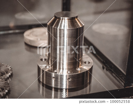 Object printed on metal 3d printer close-up. Object printed in laser sintering machine. Modern 3D printer printing from metal powder. Concept progressive additive DMLS, SLM, SLS Object printed on metal 3d printer close-up. Object printed in laser sintering machine. Modern 3D printer printing from metal powder. Concept progressive additive DMLS, SLM, SLS 100052558