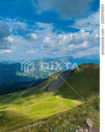 Mountain range in Swiss Alps in sunny day Mountain range in Swiss Alps in sunny day 100054264