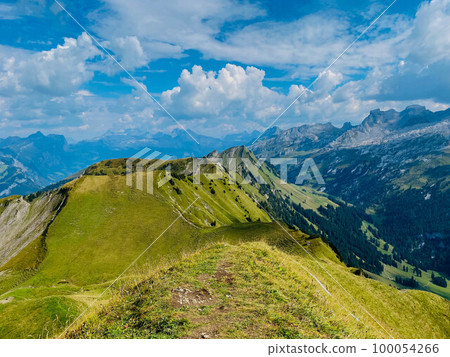 Mountain range in Swiss Alps in sunny day Mountain range in Swiss Alps in sunny day 100054266