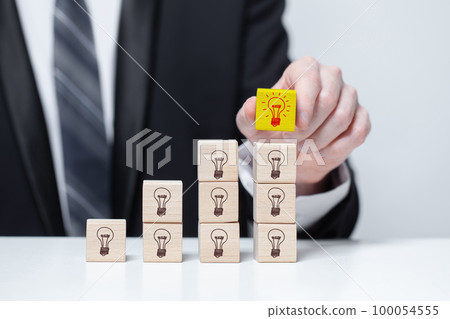 Businessman collecting ideas. Ideasmaker. Idea, brainstorming and creativity concept Businessman collecting ideas. Ideasmaker. Idea, brainstorming and creativity concept 100054555