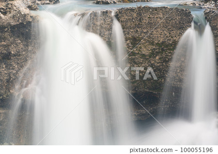 Spring Niagara waterfall in Montenegro with fast water stream Spring Niagara waterfall in Montenegro with fast water stream 100055196