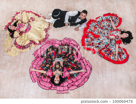 top view. dance group performing Gypsy folk dance 100060478