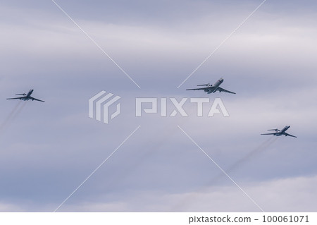 Russia. Kronstadt. July 31, 2022. A flight of Tu-154 and Tu-134UBL aircraft at the naval parade. Russia. Kronstadt. July 31, 2022. A flight of Tu-154 and Tu-134UBL aircraft at the naval parade. 100061071