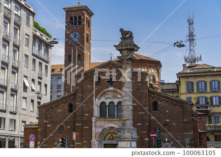Milan, Italy San Babila church facade with bell tower. External day view of Roman Catholic church at homonymous Milano square. 100063105