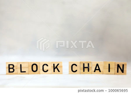 Blockchain text on wooden cubes, cryptocurrency,technology binary code, ditigal data and secure money, ledger bitcoin concept copy space background 100065695
