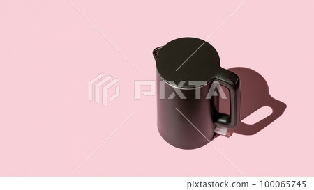 Matte black kettle casts shadow on a pink background. 100065745