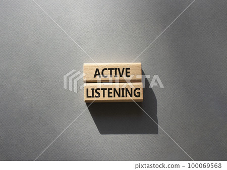 Active listening symbol. Wooden blocks with words Active listening. Beautiful grey background. Business and Active listening concept. Copy space. Active listening symbol. Wooden blocks with words Active listening. Beautiful grey background. Business and Active listening concept. Copy space. 100069568