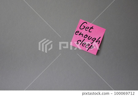 Get enough sleep symbol. Concept words Get enough sleep on pink steaky note. Beautiful grey background. Healthy lifestyle, medical and Get enough sleep concept. Copy space. Get enough sleep symbol. Concept words Get enough sleep on pink steaky note. Beautiful grey background. Healthy lifestyle, medical and Get enough sleep concept. Copy space. 100069712
