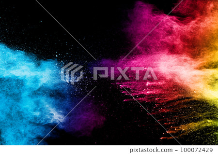 Explosion of colorful Holi powder on black background. Vibrant color dust particles textured background. 100072429