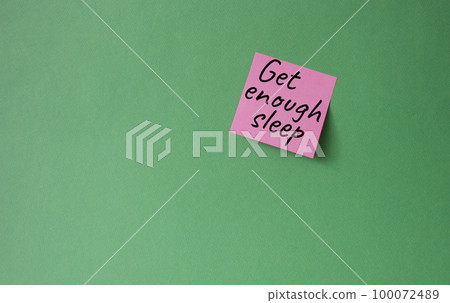 Get enough sleep symbol. Concept words Get enough sleep on pink steaky note. Beautiful green background. Healthy lifestyle, medical and Get enough sleep concept. Copy space. Get enough sleep symbol. Concept words Get enough sleep on pink steaky note. Beautiful green background. Healthy lifestyle, medical and Get enough sleep concept. Copy space. 100072489