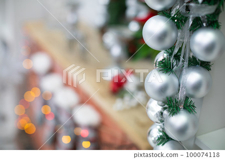 Silver baubles on spruce branches decorated for during Christmas. Silver baubles on spruce branches decorated for during Christmas. 100074118