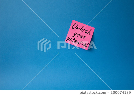Unlock your Potential symbol. Concept words Unlock your Potential on pink steaky note. Beautiful blue background. Business and Unlock your Potential concept. Copy space. Unlock your Potential symbol. Concept words Unlock your Potential on pink steaky note. Beautiful blue background. Business and Unlock your Potential concept. Copy space. 100074189