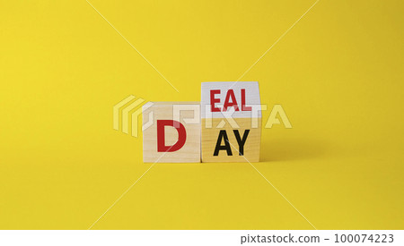 Deal of the Day symbol. Turned cube with words Deal of the Day. Beautiful yellow background. Business and Deal of the Day concept. Copy space Deal of the Day symbol. Turned cube with words Deal of the Day. Beautiful yellow background. Business and Deal of the Day concept. Copy space 100074223