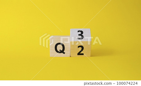 From 2nd Quarter to 3rd symbol. Turned wooden cube with words 2nd Quarter and 3rd Quarter. Beautiful yellow background. Business and Quarter concept. Copy space From 2nd Quarter to 3rd symbol. Turned wooden cube with words 2nd Quarter and 3rd Quarter. Beautiful yellow background. Business and Quarter concept. Copy space 100074224