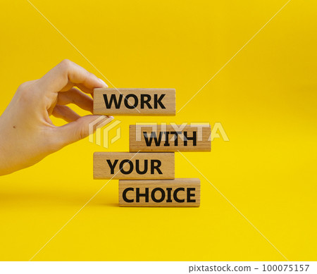 Work with your choice symbol. Wooden blocks with words Work with your choice. Beautiful yellow background. Businessman hand. We Work with your choice concept. Copy space. 100075157