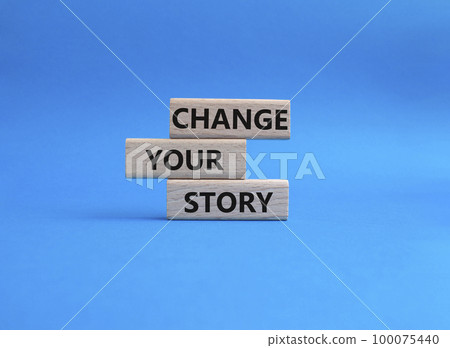 Change your story symbol. Concept word Change your story on wooden blocks. Beautiful blue background. Business and Change your story concept. Copy space 100075440