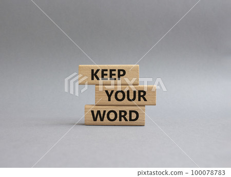 Keep your word symbol. Wooden blocks with words Keep your word. Beautiful grey background. Business and Keep your word concept. Copy space. 100078783