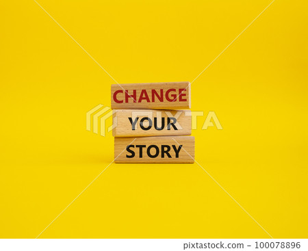 Change your story symbol. Concept word Change your story on wooden blocks. Beautiful yellow background. Business and Change your story concept. Copy space 100078896