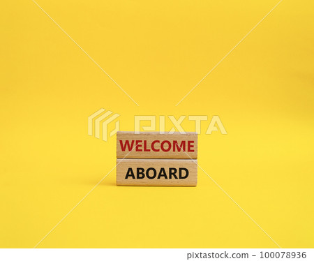 Welcome aboard symbol. Concept word Welcome aboard on wooden blocks. Beautiful yellow background. Business and Welcome aboard concept. Copy space Welcome aboard symbol. Concept word Welcome aboard on wooden blocks. Beautiful yellow background. Business and Welcome aboard concept. Copy space 100078936
