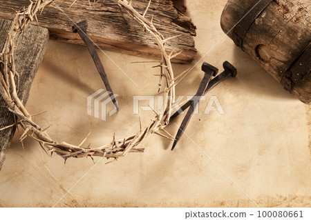 Crucifixion Of Jesus Christ. Cross With three Nails And Crown Of Thorns on ground 100080661