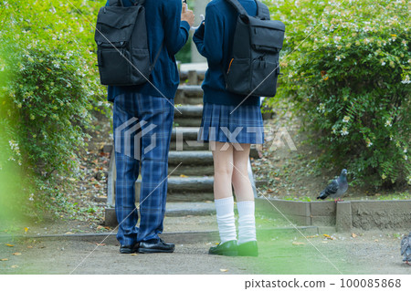 High school student couple rain High school student couple rain 100085868