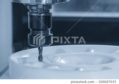 The CNC milling machine cutting the nylon 6 material part with ball end mill tool. The CNC milling machine cutting the nylon 6 material part with ball end mill tool. 100087035