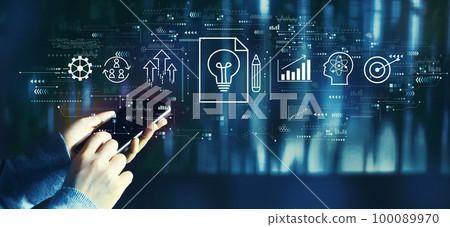 Idea of success theme with person using smartphone Idea of success theme with person using smartphone 100089970